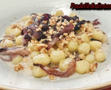 GNOCCHI CON CREMA DI TALEGGIO RADICCHIO ROSSO E GRANELLA DI NOCI.